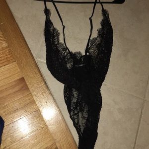 small sexy black lingerie bodysuit